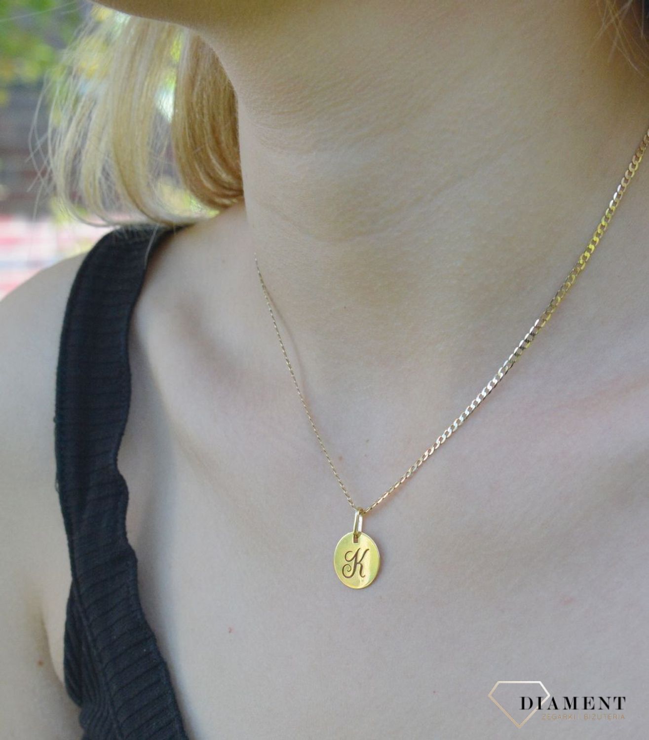 Złota zawieszka 585 z literką K ZA 2128K. modna złota zawieszka wykonana z najwyższej próby złota 585. Zawieszka w kształcie litery K. Zawieszka Siwiec, Rozenek Idealny pomysł na prezent.  Literka K. Zawieszka K..jpg